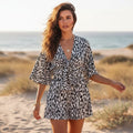 Women's V-Neck Romper With Wide Leg and Flared Sleeves - Black & White