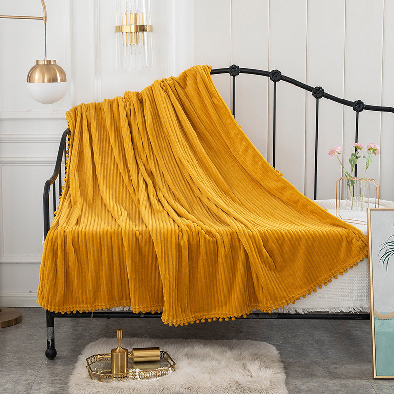 Sofa Throws in Soft Ribbed Plush with Pom-Pom Trim